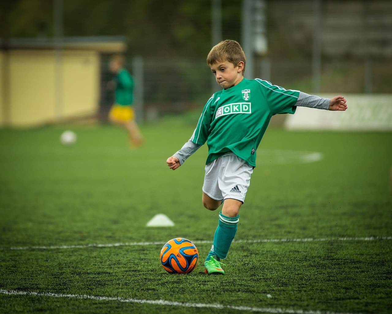 Young athlete wearing sports helmet - concussion safety in youth sports