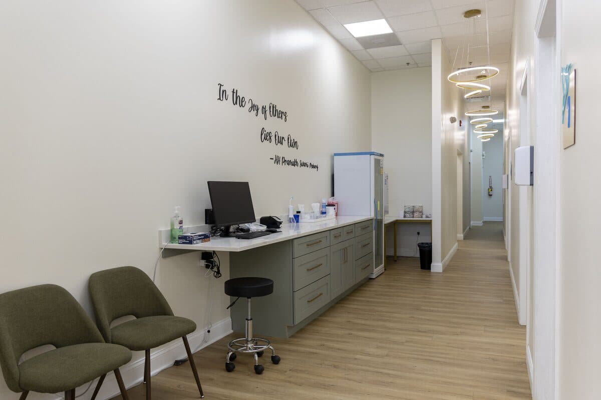 Wide hallway view showing modern pediatric office layout at Hummingbird Pediatrics Mercer County NJ